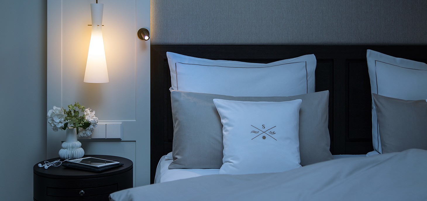 Comfortable bed at the hotel of Severin*s Resort and spa on Sylt