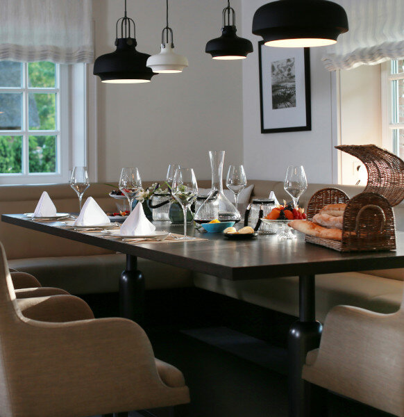 Gedeckter Tisch in Restaurant des Severin*s Resort & Spa Sylt