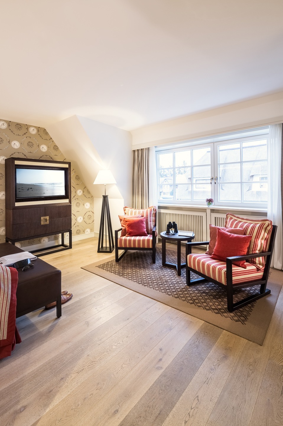Living room with television Superior Double Room in the Severin*s Resort & Spa on Sylt