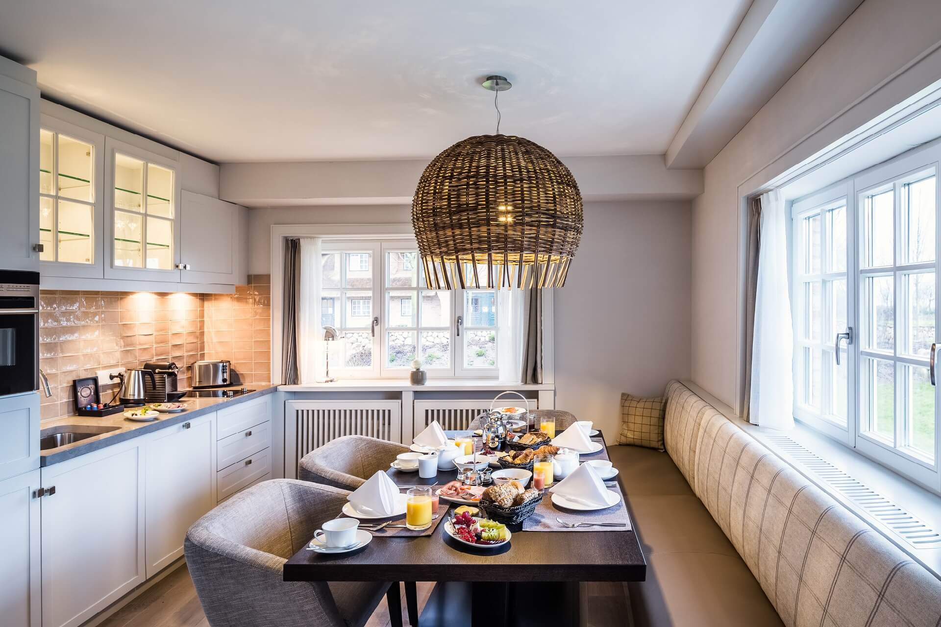 Hotel rooms & suites kitchen with laid table luxus hotel Keitum