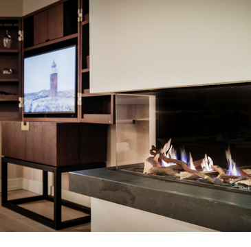 Severin*s Suite living area fire place 5 star hotel Sylt