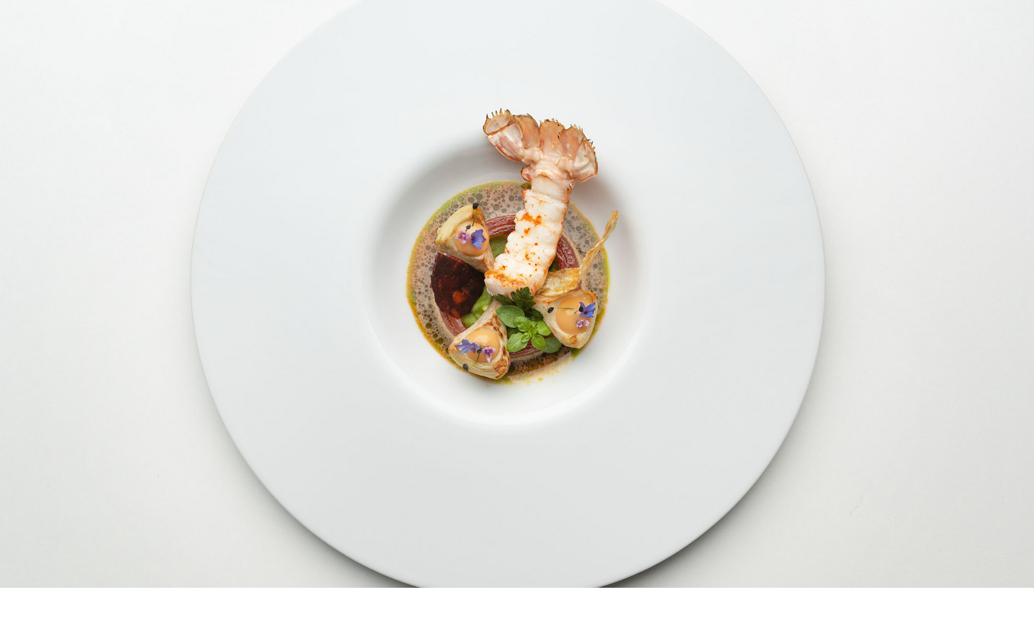 Restaurant Tipken's by Nils Henkel | Dish: Norway lobster with chorizo jus and artichokes