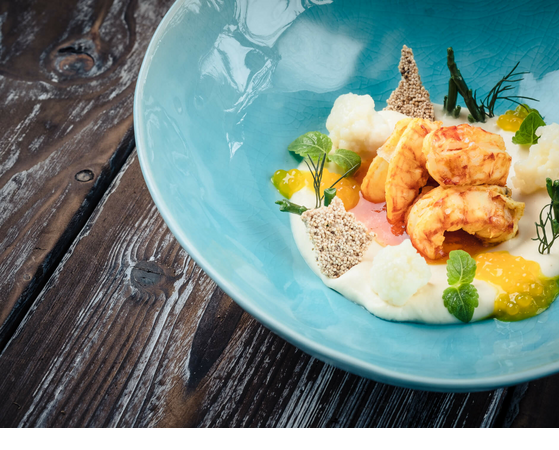 Tellergericht mit Fisch und Kartoffelkreation