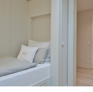 Maisonette Family Senior Suite Blick in verschiedene Schlafzimmer Hotel Sylt