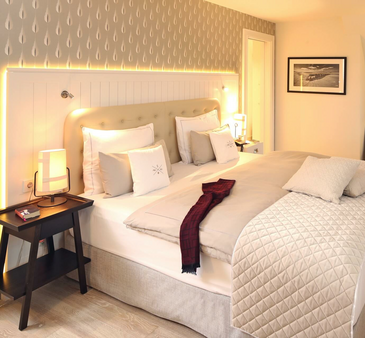 Schlafzimmer im Haus Severin*s – Severin*s Resort & Spa auf Sylt