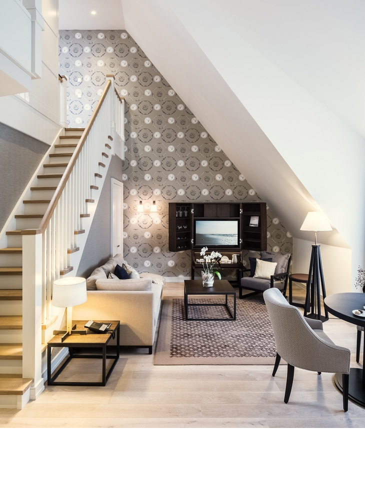 Living area and stairs in Maisonette Senior Suite in Hotel Severin*s on Sylt