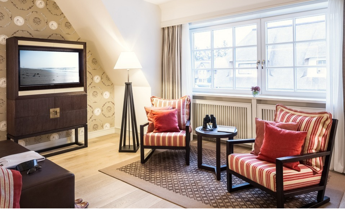 Living room with television Superior Double Room in the Severin*s Resort & Spa on Sylt
