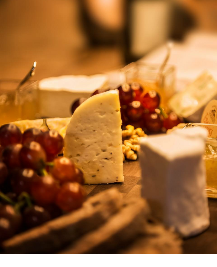 Cheese specialties and grapes in the wine cellar of the Hotel Severin*s on Sylt